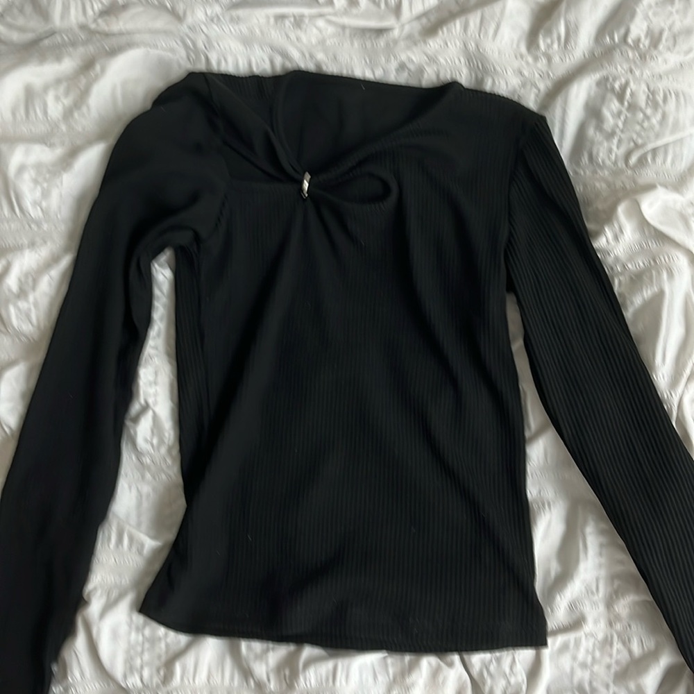 black cutout acubi top with silver accent